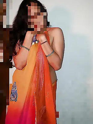 indian milf in a orange sari and a red blouse that wont stay on album
