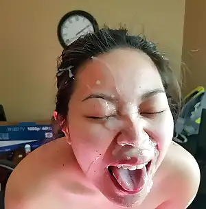 asian girl plastered in cum